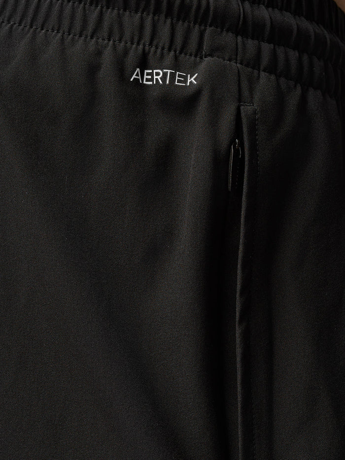 Close-up of waistband area on black Adapt Training 6in shorts with Aertek logo and a side zipper pocket
