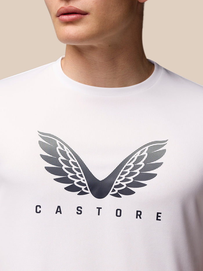 Close up front view of white Adapt Training T Shirt with Castore wings logo on chest