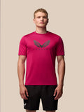 Front view of a male model wearing pink Adapt Training T-Shirt with Castore wings on the chest.