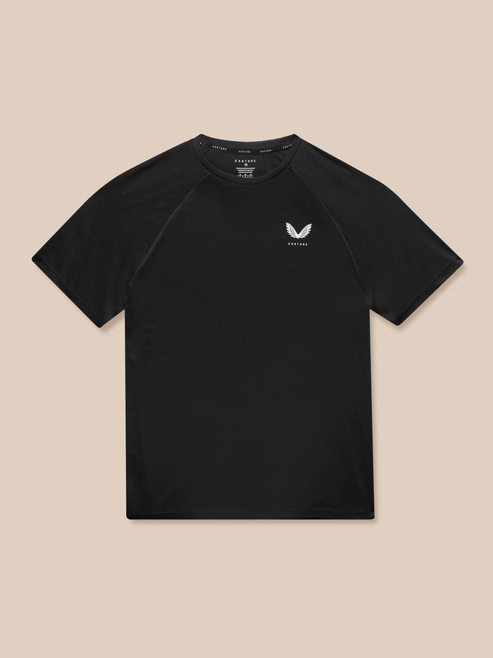 Front view of male model wearing black Adapt Training T-Shirt with Castore logo on the chest.