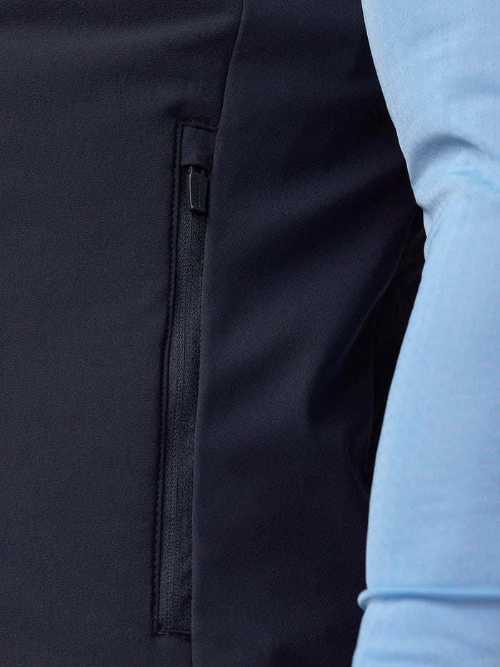Zippered side pocket on navy Apex Training Gilet