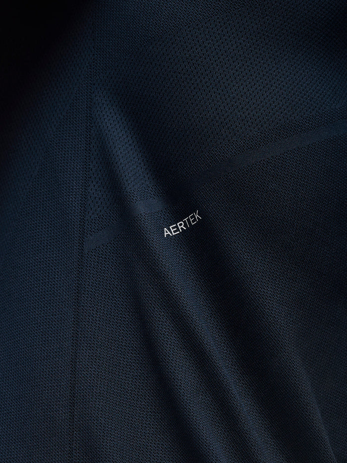 Close-up of dark navy Apex Training T Shirt fabric showing AERTEK branding