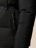 Close up of a black puffer jacket vertical side pocket zip with Castore branded zipper pull