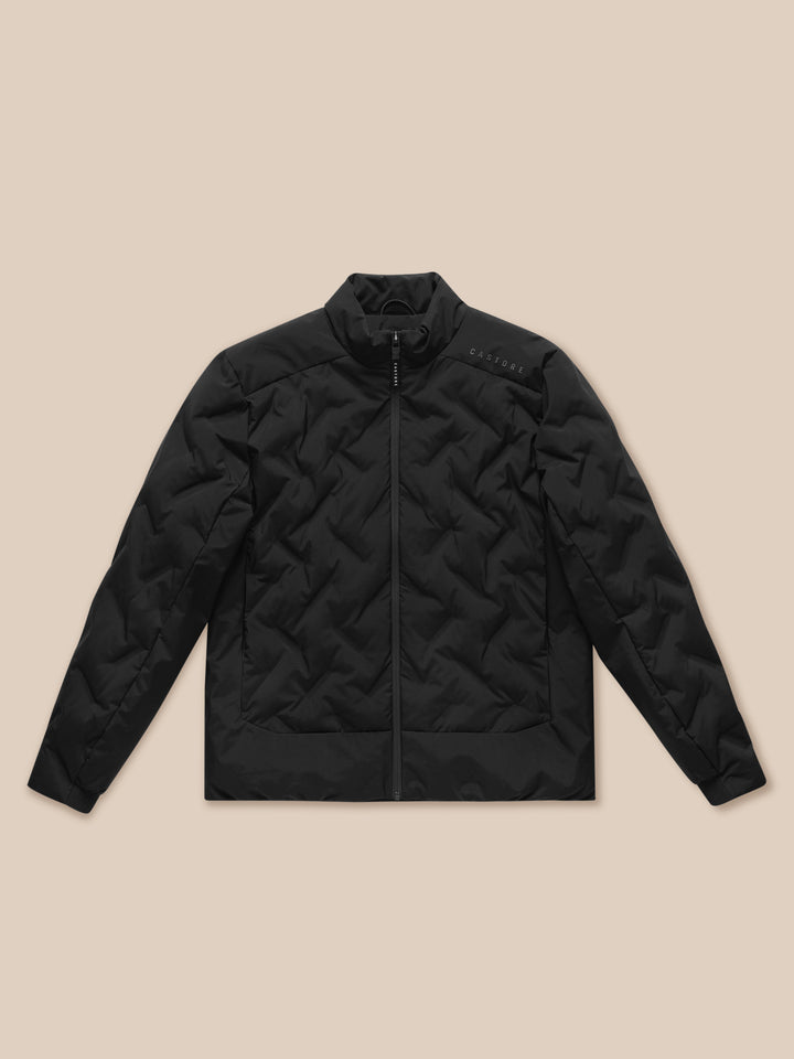 Close-up of black quilted fabric texture with a subtle grid pattern