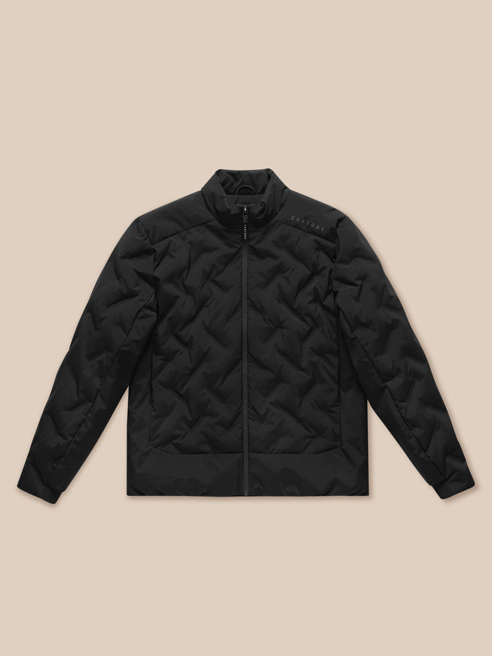 Close-up of black quilted fabric texture with a subtle grid pattern