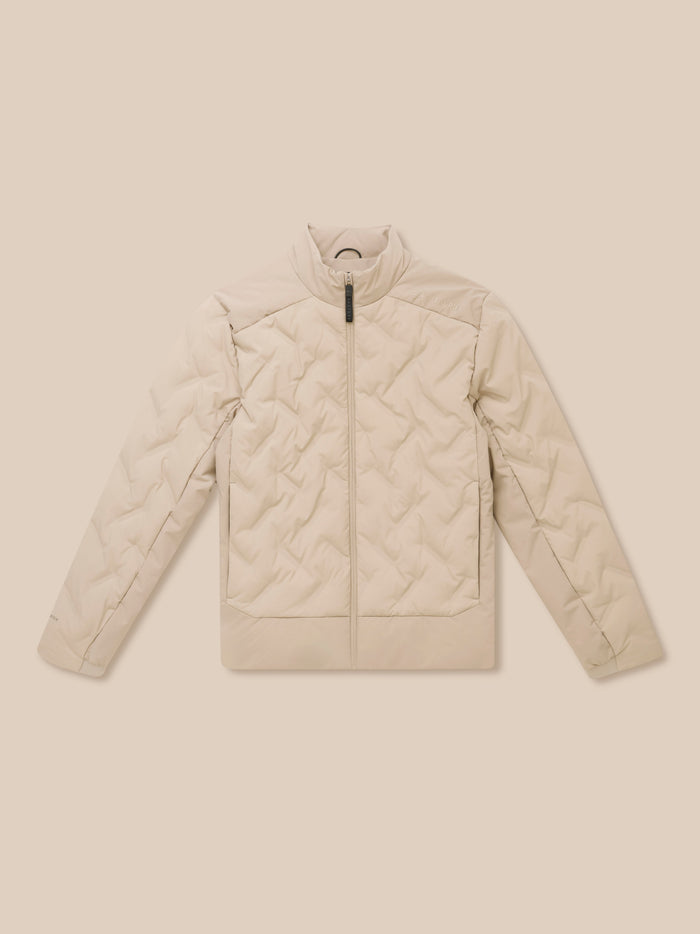 Mushroom beige padded jacket with a zip front and quilted panels against a pale beige background.