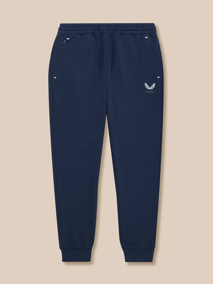 Full front view of navy Travel Joggers with drawstring waistband and ribbed cuffs.