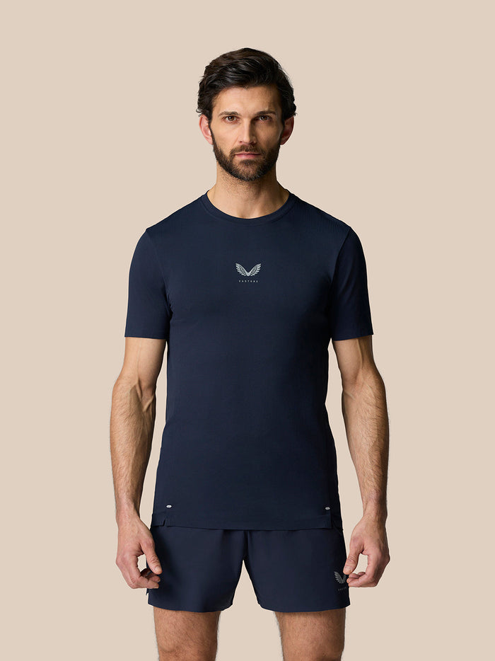 Male model wearing midnight navy Zone Training T-Shirt with matching shorts.