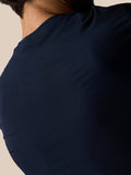Back view of man wearing midnight navy Zone Training T-Shirt highlighting ribbed shoulder panel.