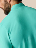 Back shoulder close-up of Zone Training top in Light Aqua highlighting ribbed panel.