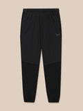 Flex Winterised Woven Joggers in black with textured lower legs and Castore branding