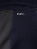 Close-up of navy fabric with water droplets highlighting ProTek water resistance.
