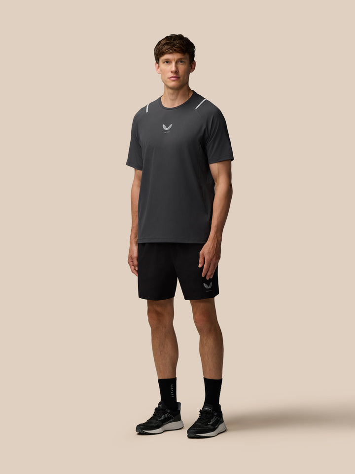 Male model wearing Apex Training 6 inch shorts in black with a small Castore logo on the left leg.