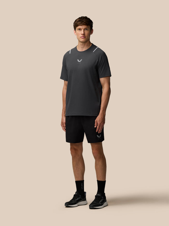Male model wearing Apex Training 6 inch shorts in black with a small Castore logo on the left leg.