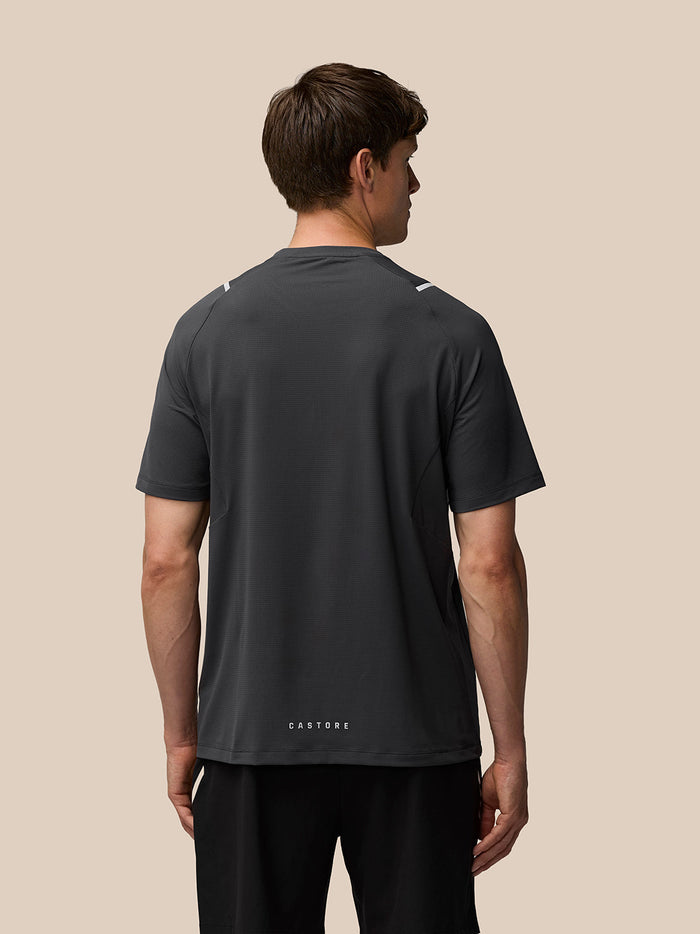 Back view of Apex Training T Shirt in gunmetal with reflective shoulders and Castore wordmark at the back hem