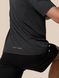 Close up of Apex Training T Shirt fabric showing mesh panels and knit texture.