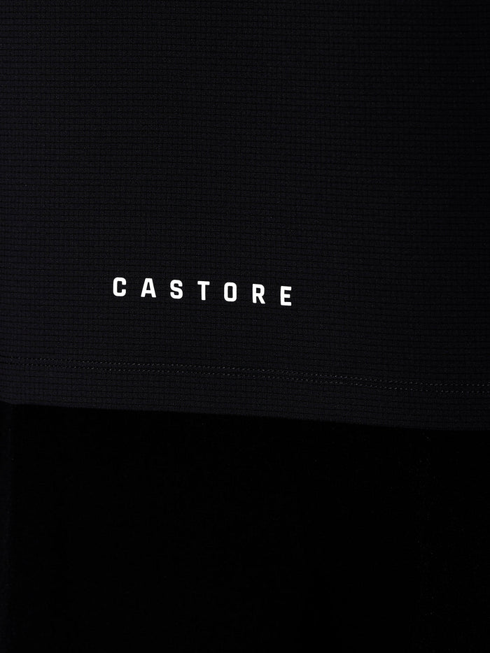 Close up of gunmetal Apex Training T Shirt featuring the Castore wordmark on the hem.
