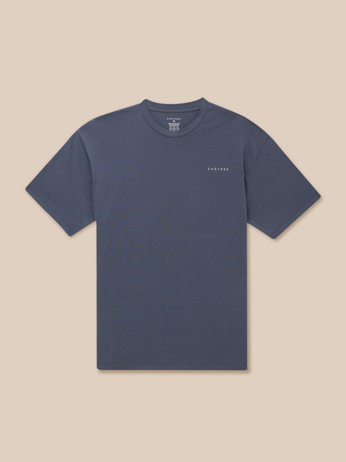 Flat lay pewter blue T shirt with crew neck and short sleeves, CASTORE logo on the left chest.