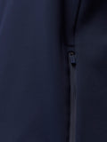 Close up of a navy zip on the hoodie with a branded zipper pull.