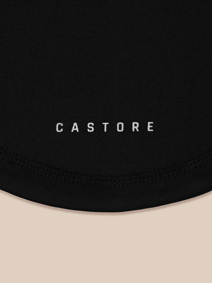 Close up of black snood fabric showing Castore branding along the lower edge