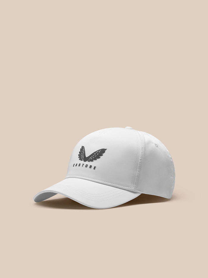White Castore cap with winged logo on the front against a neutral background.