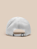 Rear view of white nylon cap with adjustable strap and black buckle; PROTEK branding visible.