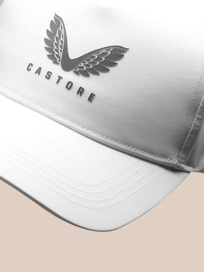 Close-up of a white Cap with Castore branding on the front panel