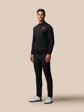Rear three-quarter view of black Club Golf Trousers on a male model