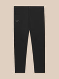 Flat lay view of black golf trousers with front button, belt loops, and a Castore logo on the left hip.