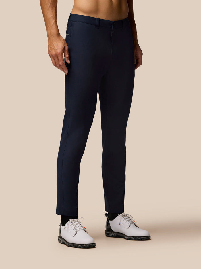 Model wearing Midnight Navy Club Golf Trousers 32 inch leg with side pockets