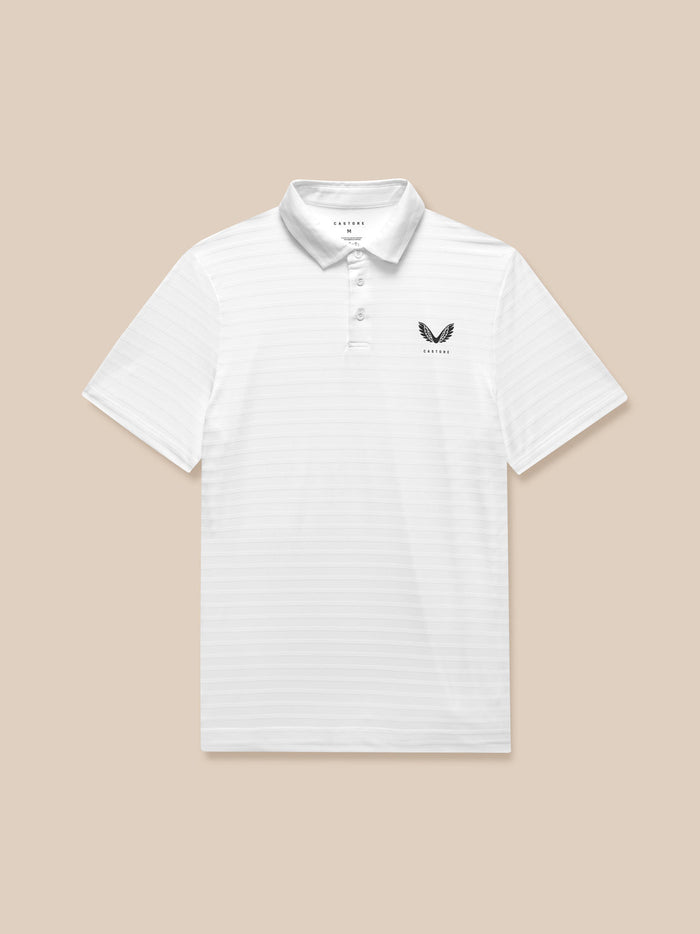 White polo shirt with subtle pique stripes and Castore branding on the left chest and upper back.