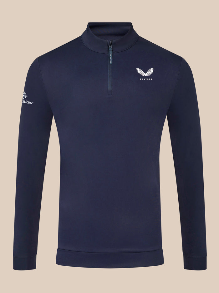 Close-up of navy Golf Club Classic top with quarter zip chest logo and sleeve branding