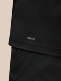 Close-up of Protek branding at the lower back of the black Pinnacle gilet.