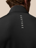 Close-up of the black vest collar with a silver Castore wing logo and zipper