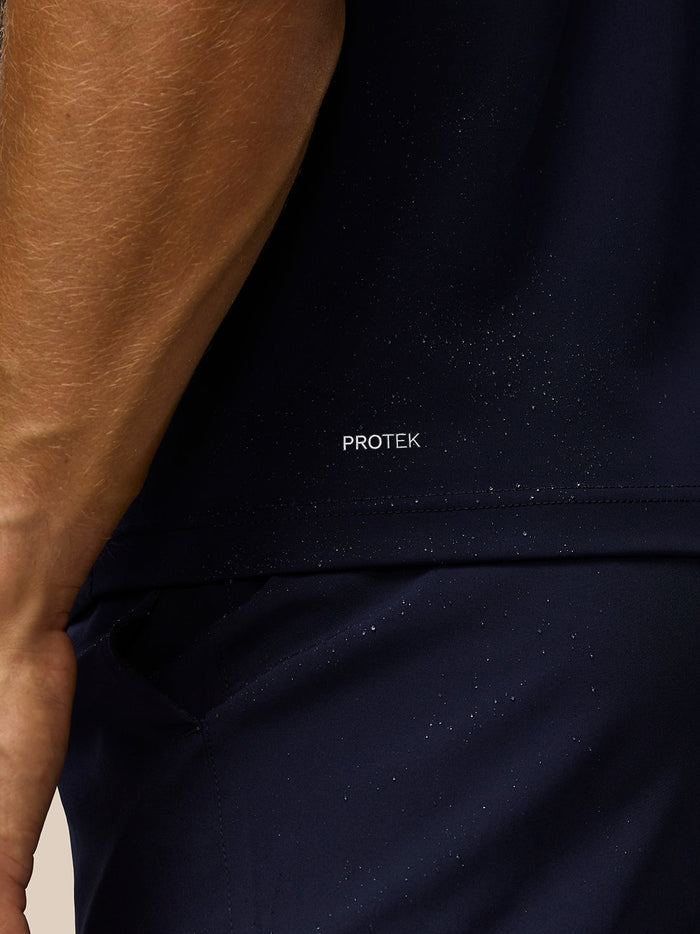 Close up of navy Pinnacle Gilet showing Protek branding on the back panel