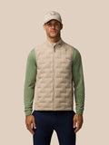 Front view of a male model wearing Mushroom Golf Pinnacle Lightweight Hybrid Gilet with quilted front and funnel collar