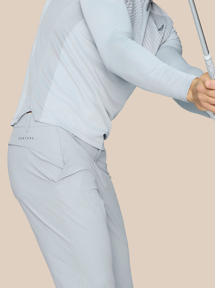 Close up of Golf Pinnacle 34 inch Trousers mid grey focusing on the gripped waistband and open side pocket