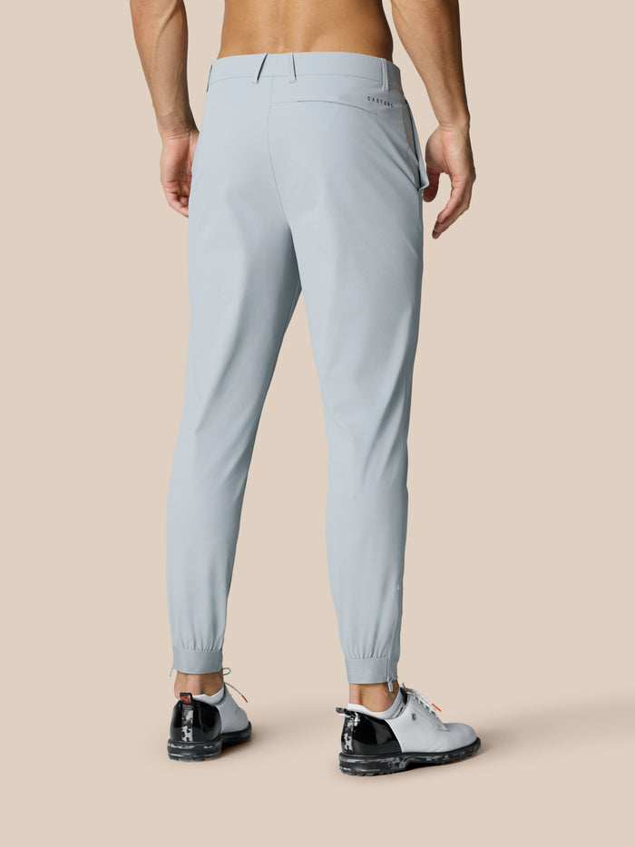 Back view of light grey Golf Pinnacle trousers with Castore branding on the back