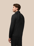 Back view of black Pinnacle Golf Jacket showing CASTORE wordmark down the back
