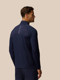 Rear view of a man in midnight navy Golf Pinnacle Jacket with stand collar