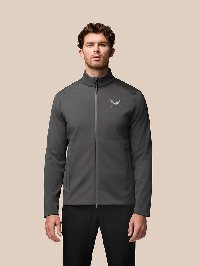 Charcoal Garcia Hybrid Jacket worn by a man, stand collar, full front zip and zip pockets.