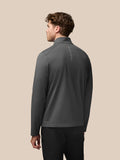 Back view of charcoal Garcia Hybrid Jacket on a model with vertical Castore branding along the spine.