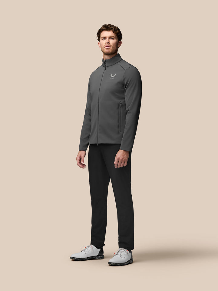 Male model wearing Garcia Hybrid Jacket in charcoal front view showcasing stand collar zip and side pockets