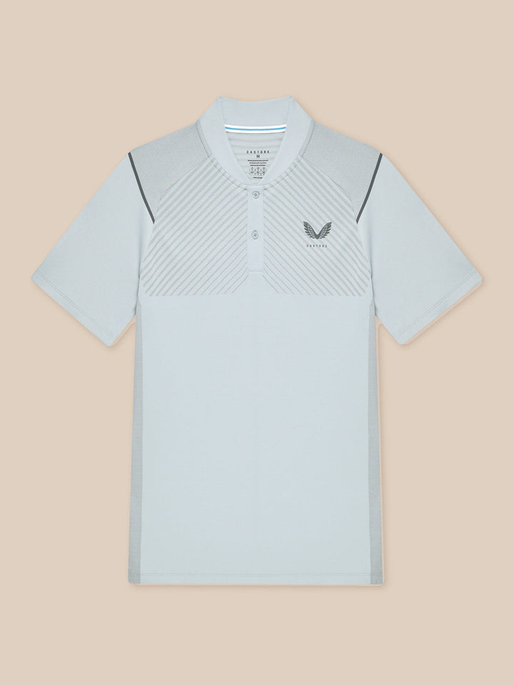 Pinnacle Golf LVS Polo in light grey shown flat with diagonal vented panels and side splits