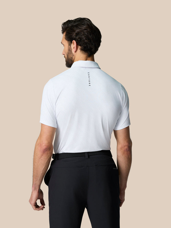 Back view of a white Club Graphic Polo showing Castore branding running down the back.