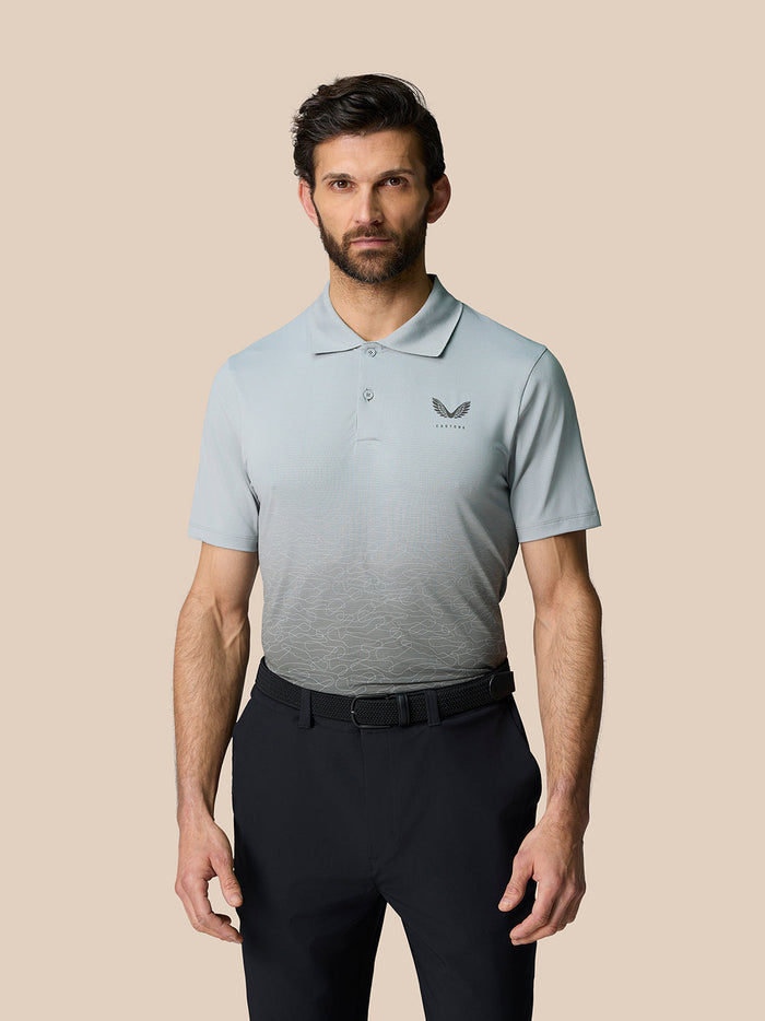 Club Graphic Polo in mid grey on a male model with subtle gradient pattern and Castore branding on chest