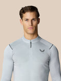 Male model wearing Pinnacle LVS 1/4 Zip Top in mid grey with diagonal knit pattern and zip collar