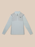 Full body view of a man in the Pinnacle LVS 1/4 Zip Top in mid grey with matching trousers against a beige background
