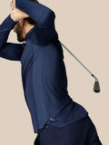Side view of a man in navy LVS 1/4 Zip Top showing mesh panels and a golf club in the frame.