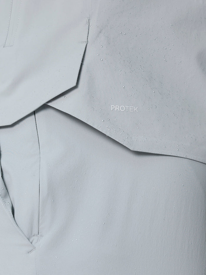 Close up of light grey ProTek fabric with water droplets and vent details